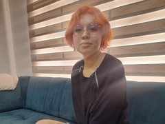 AngellDustt - female with red hair and  small tits webcam at ImLive