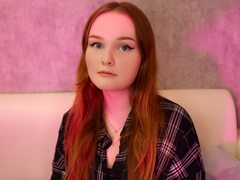 ArianaSwiss - female with red hair and  big tits webcam at ImLive