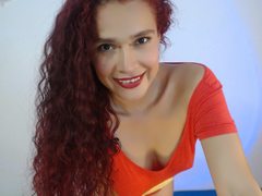 Biikergiirl1 - female with red hair and  small tits webcam at ImLive