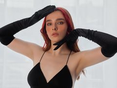 DaisyMills - female with red hair and  big tits webcam at LiveJasmin