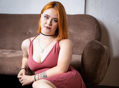 JanettMarshall - female with red hair and  small tits webcam at LiveJasmin