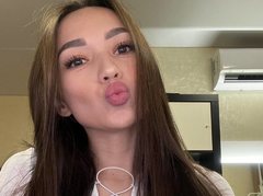 Kristiana - female with brown hair and  small tits webcam at ImLive