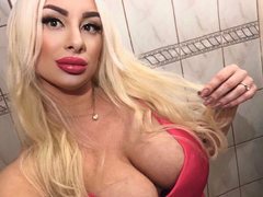 Luxuria - blond female with  big tits webcam at ImLive