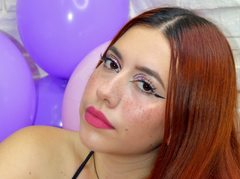 Meghan_White - female with red hair and  small tits webcam at ImLive