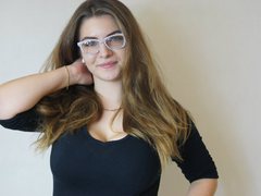 SandyKiss - female with brown hair and  big tits webcam at xLoveCam