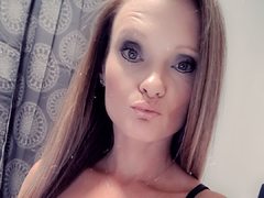 Sexygingergrl - female with red hair and  small tits webcam at ImLive