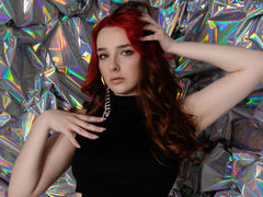 DaisyMills - female with red hair and  big tits webcam at LiveJasmin