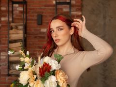 DaisyMills - female with red hair and  big tits webcam at LiveJasmin