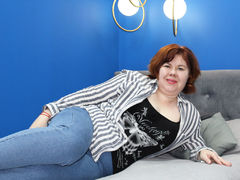 EmiliaReddson - female with red hair and  big tits webcam at LiveJasmin