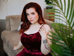 EvaOllin - female with red hair and  big tits webcam at LiveJasmin