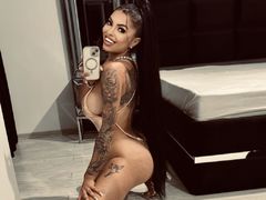 RheaQuin - female with black hair and  big tits webcam at LiveJasmin