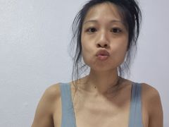 WasabeKitten - female with brown hair and  big tits webcam at LiveJasmin