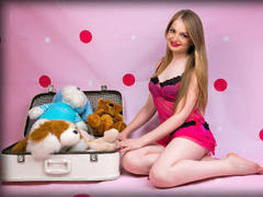 Emelline - female with brown hair and  small tits webcam at xLoveCam