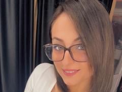 ClaraSun - female with brown hair and  big tits webcam at xLoveCam