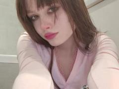 DollyKitty - female with brown hair and  small tits webcam at xLoveCam