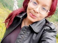 EmmyNasty - female with red hair and  big tits webcam at xLoveCam