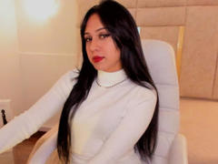 Irinna - female with brown hair and  small tits webcam at xLoveCam