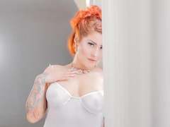 SavannahJanson - female with red hair and  big tits webcam at LiveJasmin