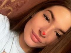 KiSaLovee - female with brown hair and  small tits webcam at xLoveCam