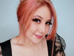 KittyCurvy - female with red hair and  big tits webcam at xLoveCam