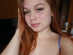 LaraPika - female with red hair and  small tits webcam at xLoveCam