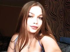 LaraPika - female with red hair and  small tits webcam at xLoveCam