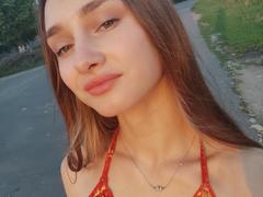 Lazara - female with brown hair and  small tits webcam at xLoveCam