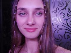 Lazara - female with brown hair and  small tits webcam at xLoveCam