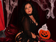MelyaBrown - female with black hair and  big tits webcam at LiveJasmin