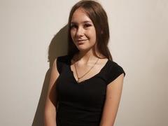 Radiancee - female with brown hair and  small tits webcam at xLoveCam