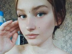 SonyaNya - female with red hair and  small tits webcam at xLoveCam