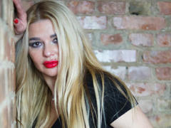 SunshineSURI - blond female with  big tits webcam at xLoveCam
