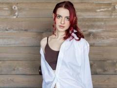 Yorogumo - female with red hair and  small tits webcam at xLoveCam