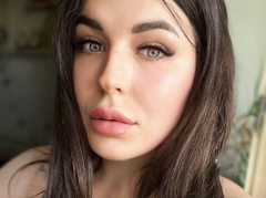 Black_Angel - female with brown hair and  small tits webcam at ImLive