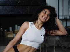 Curliest_Sue - female with black hair and  small tits webcam at ImLive