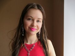 Ariana - female with brown hair and  small tits webcam at ImLive