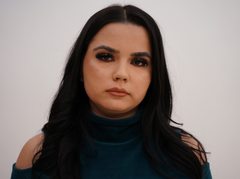 RheaGilmore - female with black hair and  big tits webcam at LiveJasmin