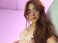 SaraRossie - female with red hair webcam at LiveJasmin