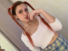 stardusya - female with red hair webcam at ImLive