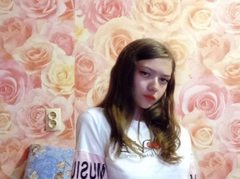 Svetik69 - female with brown hair and  small tits webcam at xLoveCam