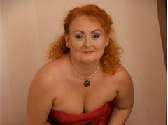 SweetLinda - female with red hair and  big tits webcam at ImLive
