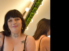 TaliaTrinityX - female with brown hair and  big tits webcam at ImLive
