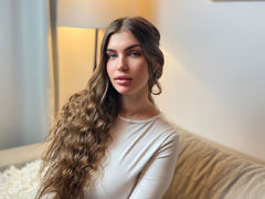 AlexandraAvdeeva - female with brown hair and  big tits webcam at LiveJasmin