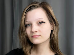 CateEmbury - female with brown hair and  small tits webcam at LiveJasmin