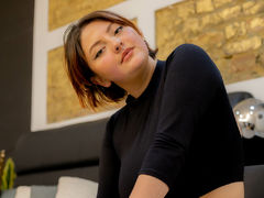 CocoVolkova - female with brown hair and  small tits webcam at LiveJasmin