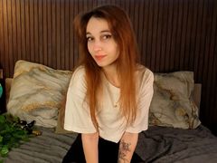 EmmaGenee - female with brown hair and  small tits webcam at LiveJasmin