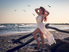 Emmelyne - female with red hair and  big tits webcam at LiveJasmin