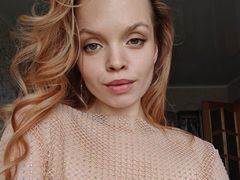 EvaSinns - female with red hair and  small tits webcam at LiveJasmin