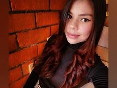 CarolyneStuart - female with brown hair and  big tits webcam at LiveJasmin