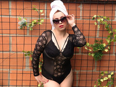 GreecyLoren - female with red hair and  big tits webcam at LiveJasmin